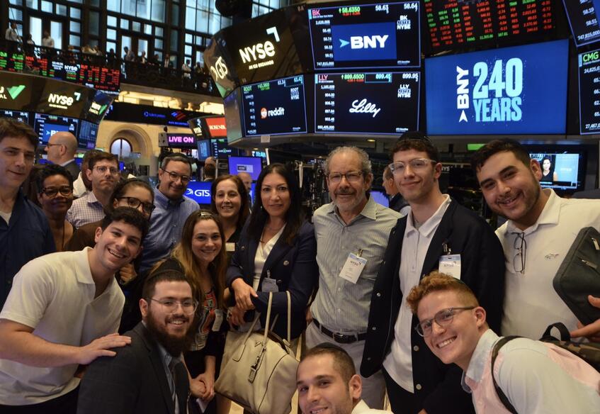 Sy Syms MBA Summer NYC Residency students with Professor Mark Finkel at the New York Stock Exchange
